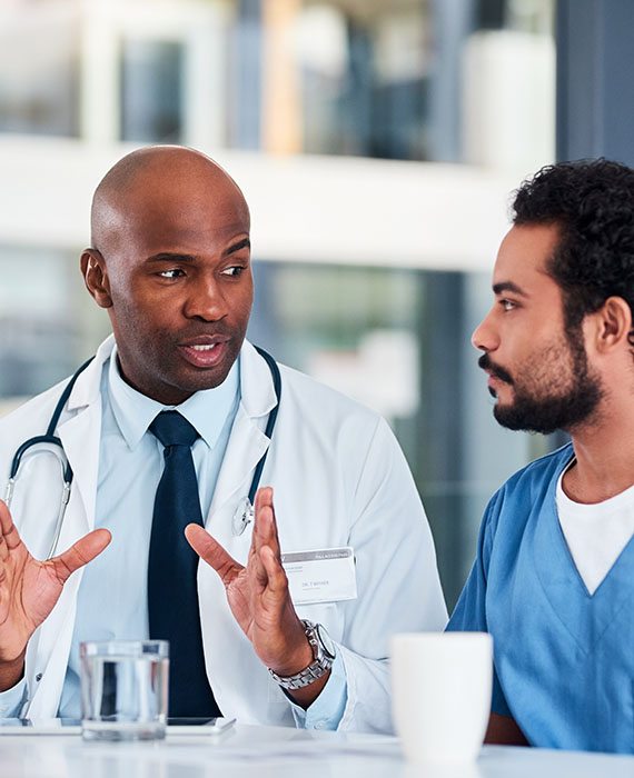 Doctor talking to a nurse